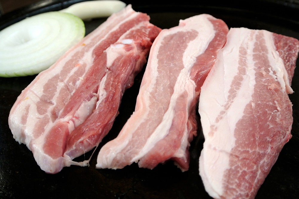 Voorraden bevroren varkensvlees fors gedaald